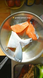 153 reactions · 25 shares | golden salmon soup ☀️ For recipe, make sure you’re following me then comment “gimme recipe” so that the message goes thru. It’s soup season, and this is one of my favs! It’s comforting, nutritious, and delicious. It’s not just the salmon that makes it good. I used shrimp heads to get that deep, rich flavor and finished it off with a splash of redboatfishsauce for extra umami. | Fationatefoodbelly | Facebook