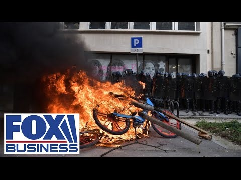 BlackRock's Paris offices swarmed by French protesters with red flares, smoke bombs