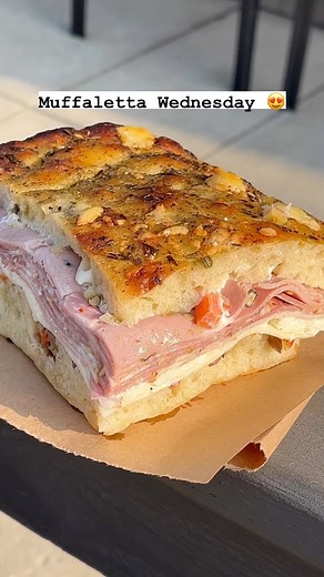 Wednesdays only! #Muffaletta piled high with @smokinggoosemeatery Mortadella, Salame Cotto, and City Ham plus provolone, mozz, giardiniera, olive salad, mayo on @ameliasbread focaccia 🍷and #WineWednesday 15% off bottles of wine to take home or drink here | Goose the Market