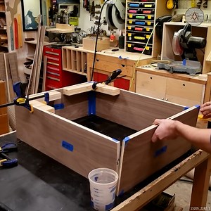 In this video I build a folding "Murphy Bar." It is designed as a classic midcentury piece that opens to display your liquor bottles and glasses with a large bar top you can sit at and enjoy a drink. When you need some extra space, the bar top can fold away, revealing a storage cabinet below. | Alm Fab