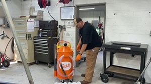 Discharging the oil, coolant, and sludge sucked up out of the Monarch coolant sump. | Abom79