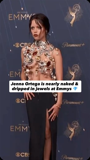 ExtraTV on Instagram: "Jenna Ortega kept the “naked” dressing trend going at the #Emmys in a top made entirely of jewels! 💎🔥"