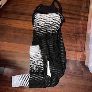An ONA black & White jumpsuit gently used. Sexy