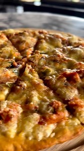 Craving pizza? Dive into our mouth-watering, cheesy goodness – the perfect slice at BlackPearl! | Black Pearl Lounge and Grill.