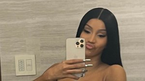 Cardi B sends temperatures soaring as she posts topless bathroom snap