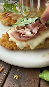Crunchy panko bread crumbs, creamy taleggio cheese, salty prosciutto, fresh arugula and juicy chicken breast…chicken milanese- it’s easy and elegant! RECIPE: https://ohsweetbasil.com/chicken-milanese/ #chicken #proscuitto #panko #taleggiocheese #chickenmilanese #pankochicken | Sweet Basil