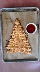 This smoky Christmas tree appetizer is a showstopper! 🎄 Watch how we turn simple refrigerated dough and cheese into a festive masterpiece - with a smoky twist that'll have everyone asking for the recipe! Holiday crafting meets BBQ? Yes please! 👇 Tag your holiday party co-host! #HolidayAppetizers #ChristmasFood #SmokingRecipes #CookinwithCowboy | Cowboy Charcoal