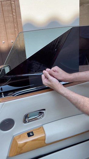 Peeling off my Rolls Royce Window Tint 🪟 #baderalsafar #window #tint #peeling #satisfying #asmr #cars #car #rollyroyce #rr #drophead #oddlysatisfying #satisfyingsounds | Bader Al Safar