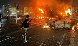 Dublin: Multiple vehicles set ablaze during protests