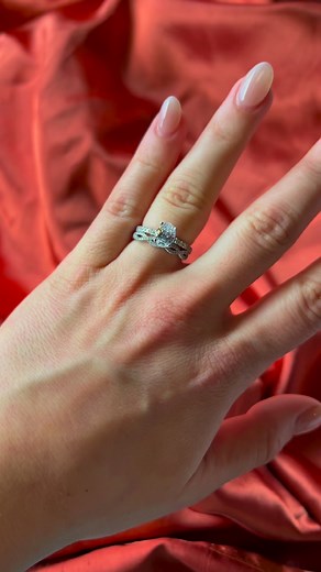 We are obsessed over these three dazzling platinum wedding bands. The first band is a twist style with a stunning array of pave diamonds. Next we have geometric style band which has alternating square and diamond shapes - bezel set with even more diamonds. Last but not least is a shared prong band that shows off many sparking diamonds along three fourths of the band. All three bands have been paired with a beautiful oval solitaire engagement ring with a French set of melee diamonds along the ban