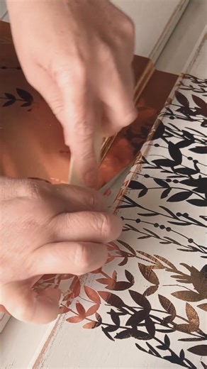 The Kacha Decor Transfer® “In the Field” rose gold foil beckons the beauty of a serene meadow into your home. Delicate, whisper-thin grasses and wild foliage in a lush rose gold hue create a tranquil yet sophisticated atmosphere. #redesignwithprima #foiltransfer @flippednchippedco | Re·design with Prima