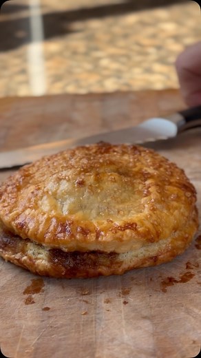 Pear & Ginger Turnover. With 1/2 a pear in each turnover this is almost 1 of your 5-a-day. The almond cream gives it a great overall base that is enhanced by the rich, spicy, ginger caramel. The pears add a lovely fruity taste that is rudely interrupted by a ginger crunch. All encased in a flaky, rich, pastry topped with crunchy Demerara sugar. I might post the recipe if there is anyone it interested. Reply below. | Gingerbread Bakery