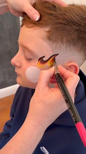 686K views · 5.1K reactions | New tutorial time !  he is a super speedy flaming football. You just know I was using the extra space too. Products used DFX white DFX black trustee pink tip brushes and my essential glitter balm fantasy dimensions. And a flame one stroke. #facepainting #viralreels #flames #emmasfantasyfaces | Emma's Fantasy Faces | Facebook