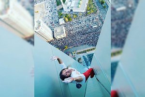 Alain Robert adds Makati tower to list of dangerous (and illegal) skyscraper climbs