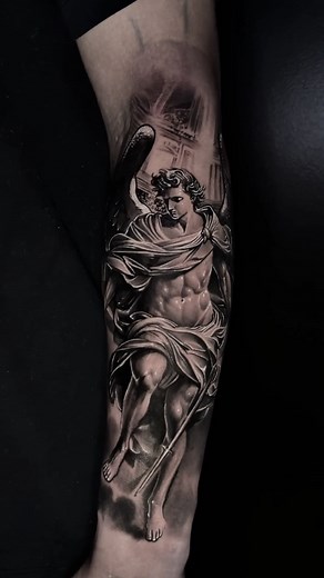 The Angel Tattoo represents purity, faith, and divine protection. A constant reminder that strength and grace come from within. #AngelTattoo #TattooMeaning #TattooArt #RealismTattoo #BlackAndGreyTattoo #TattooDesign #TattooStudio #TattooCommunity | Washington Tattoo