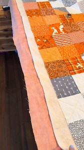 Trimming a quilt to use my backing as my binding. Video by Meagan The Quilter #quiltersoftiktok #quilttok #quiltingtherapy | Jennifer