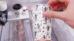 Jingmore 100 Pack 12 oz Halloween Disposable Coffee Cups with Lids and Sleeves Hot Cold Beverage Coffee Juice Drinking Cups for Halloween Party Decoration(Skeleton)