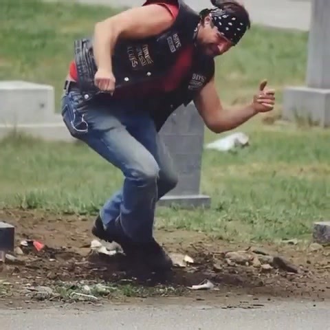 A biker showed up at my wifes grave every week and I had no idea who he was. For six months I watched him from my car. Same day. Same time. Every Saturday at 2 PM he'd roll up on his Harley, walk to Sarah's headstone, and sit there for exactly one hour. He never brought flowers. Never said a word that I could see. Just sat cross-legged on the ground next to her grave with his head bowed. The first time I saw him, I thought maybe he had the wrong grave. The cemetery's big. People get confused. Bu