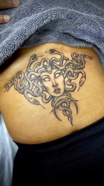 Stunning Medusa Sternum Tattoo Art