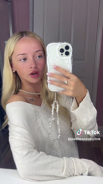Petite Blonde with Blue Eyes Bops Along