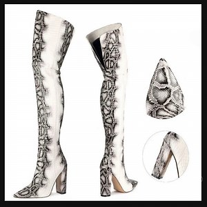 🔥 Strut your stuff in these 🔝 Sexy Block High Heels Grey Python White Thigh Boots 🔝 Perfect for making a statement on the Spring runway 🌸 Complete your look with these fierce Pointy Toe Over Knee Boots 👠 Don't miss out on being the ultimate fashionista with these Runway Knight Boots 💁‍♀️ #SexyHeels #PythonPrint #RunwayReady #SpringFashion #OverTheKnee #PointyToe #ThighHigh Shop Now https://www.kimlud.com/products/sexy-block-high-heels-grey-python-white-thigh-boots-pointy-toe-over-knee-boot