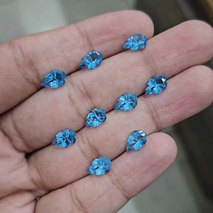 Swiss Blue Topaz carved Leafs! #swissbluetopaz | Labradorite KING