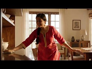 An indian curvy milf sensually teasing the viewer with her breasts