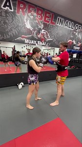Kaitlyn smashing pads with Coach Rich壘 壘壘壘 #rebelthaiboxing #suffolkcounty #nassuacounty #rebelthaiboxingsmithtown #rebelthaiboxinglevittown #muaythai #fitness #workout | Rebel Thaiboxing | Facebook