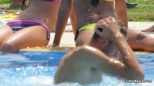 CANDID-BEACH - Topless Bikini Babes flashing their assets voyeur hd video