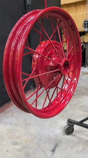 Ford Model A wheel in Nostalgic Red #prismaticpowders #dfwcoating #powdercoating #ford #fordmodela #vintagerestorations #decorations #powdercoatingservice #dfwpowdercoating | DFW Coating