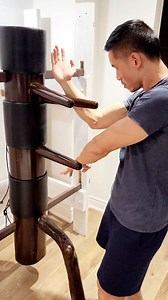 11K views · 1K reactions | Gaang Sao wooden dummy practice Gaang Sao is a technique where the forearm (of the lower positioned arm) is used to block or redirect an opponent's strike, emphasizing deflection and simultaneous counters with the opposite arm. Engagement of the wrist at the point of contact will increase the effectiveness of the movement. | Wing Chun Club | Facebook