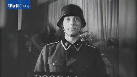 1944: Heinrich Himmler awards Nazi medals and visits school