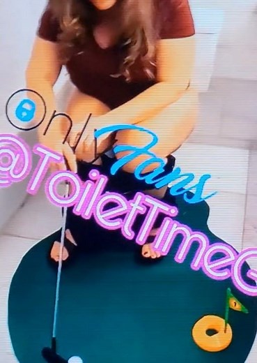 girl pooping on the toilet