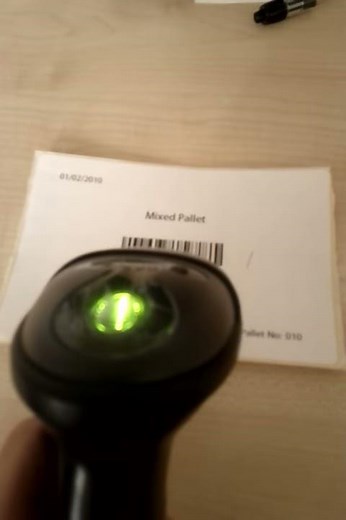 Symbol LS2208 barcode scanner in action