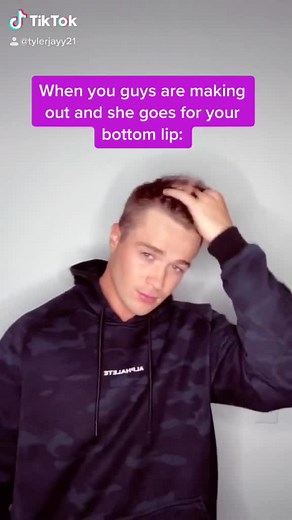 Girlfriend Grabs Boyfriend's Lip During Make Out Session