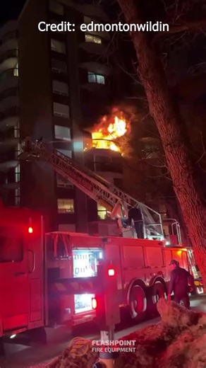 Edmonton Fire Rescue cooling things down prior to interior attack. | Flashpoint Equipment