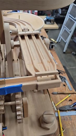 First test of the ball splitter. I need to feed the scoops evenly to ensure the flow rate will keep up with the supply. #woodworking #sculpture #kineticsculpture #marblemachine | Larry Marley