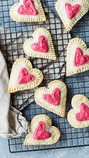 RASPBERRY HEART TARTS ❣️⁣ ⁣ Weekend project ♥️ Making these homemade pop tarts filled with fresh raspberries that are perfect as a gift for teacher, friends or anyone you love.⁣ ⁣ Comment HEART below and The recipe will pop up in your DM’s! ⁣ ⁣ #weelicious #valentines #heart #tarts #baking #easyrecipes #happyvalentines ⁣ ⁣ 🩷❤️🧡💛💚🩵💙💜⁣ ⁣ https://weelicious | weelicious