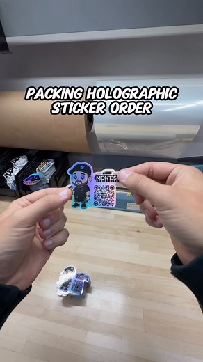 Packing a custom holo sticker order Size 2”x4” #pov #orders #smallbusiness | AADesigns.co