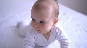 Smiling Baby Girl Trying Crawl On Stock Footage Video (100% Royalty-free) 1011312722 | Shutterstock