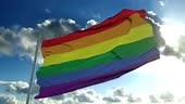 Gay pride flag video waving in wind. Colorful Rainbow Gay Flag LGBT...