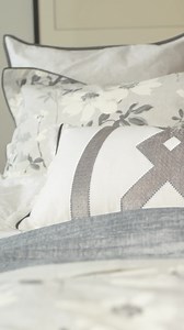 Introducing Sefa from @bedeckofbelfast an eastern inspired floral design that delights in muted silver to bring a considered look to your bedroom scheme. Layer the look with the fringed cushion with textured embroidery and velvet look throw in silver to add distinguished accents to the overall story. . . #bedeckofbelfast #bedding #beddingcollection | Bedeck | Facebook
