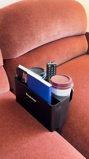 Introducing the ultimate couch companion! 🛋️ Say goodbye to reaching for your drink or remote with our convenient couch holder. #Brookstone #DoLifeBetter #SofaEssentials #MustHaves #WeekendEssentials #relaxation | Brookstone.com