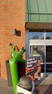 Wacky waving inflatable arm flailing tube man says you should stop by and check out our Crab & Seafood Sale! 🦀🐚🍣 | Hy-Vee