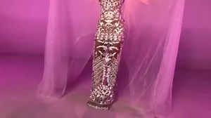 Elegant White Gown Performance with Ethereal Background