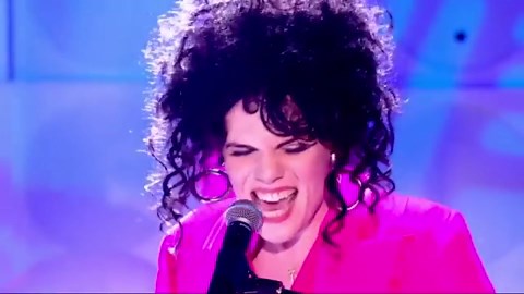 Trans comedian Jordan Gray performs on Friday Night Live