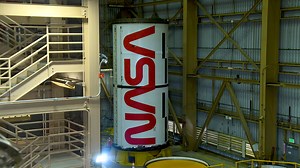 Artemis II Rocket Boosters: NASA “Worm” Logo Added | Kennedy Space Center FriendsofNASA.org: Teams with NASA’s Exploration Ground Systems Program at the agency’s Kennedy Space Center in Florida completed painting the NASA “worm” logotype onto the booster motor segments that will form the Space Launch System (SLS) rocket’s twin solid rocket boosters for Artemis II, the first crewed mission of NASA’s Artemis campaign. Crews began painting the logo Jan. 22, 2024, and completed the painting and prim
