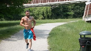 Shirtless Muscle Man Jogging On Pathway Stock Footage Video (100% Royalty-free) 17261803 | Shutterstock