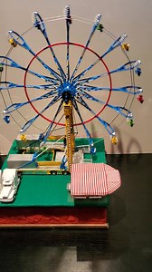 Seattle Wheel - Eckard Family Shows. Mfg: Don Cummons Finish: Skip Reed Scale: 1:87 (HO) Show Name: Eckard Family Shows Alias: Monarchs of the Midway Unit: Blue Midway Category: Major General lot placement: Back, West End | Eckard Family Shows