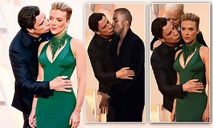 Travolta's Oscar smooch with Scarlett Johansson becomes hilarious meme
